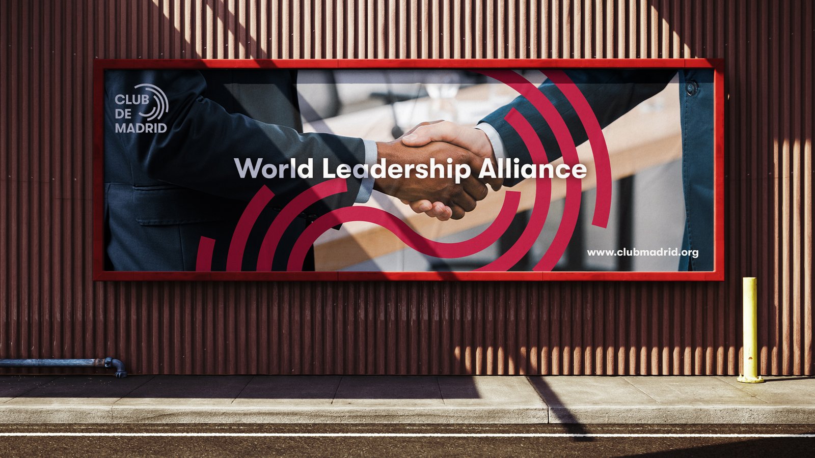 Club de Madrid World Leadership Alliance billboard using the refreshed visual system.